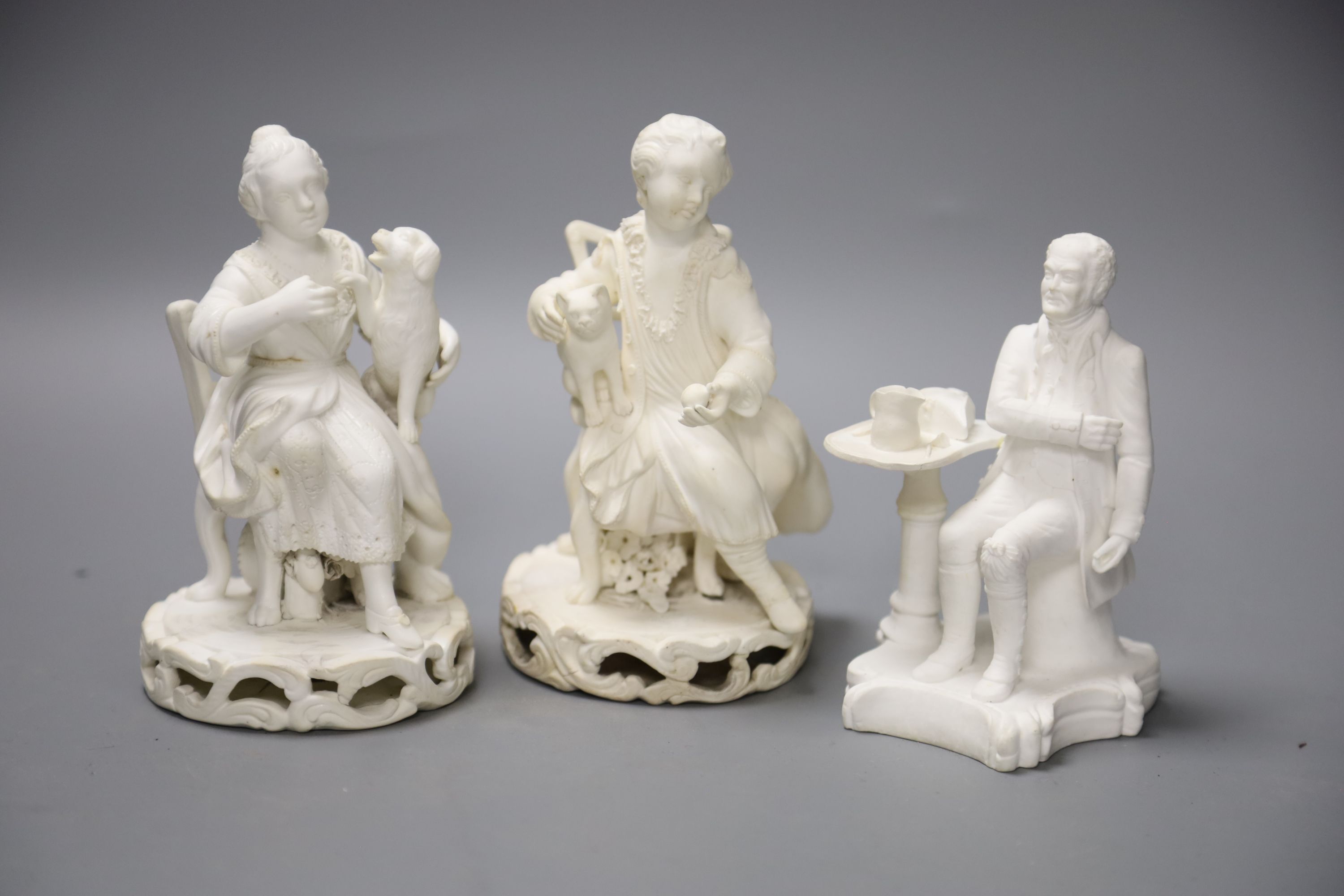 An early 19th century pair of Derby biscuit figures of a boy with a cat and a girl with a dog and a Minton figure of a Chelsea pensione